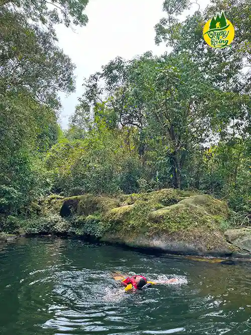 the gypsy chiring swimming in a river in mawlyngbna meghalaya