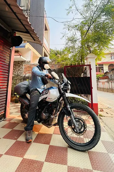 how to prepare your home to travel long term worry free - me on my motorcycle for a long travel trip