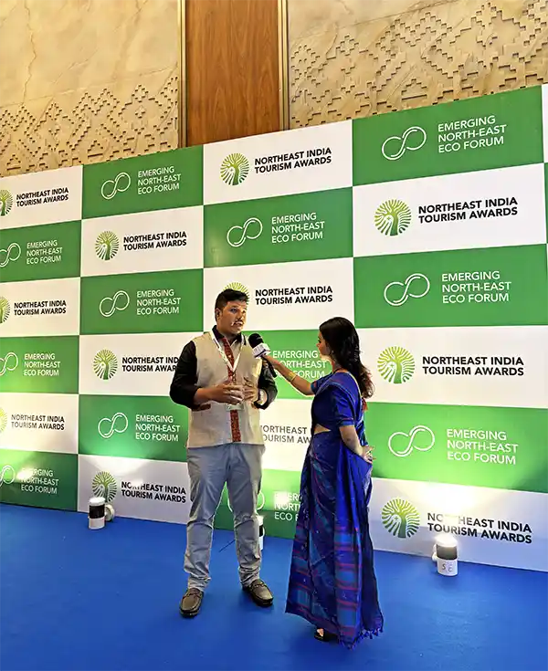 Joydeep The Gypsy Chiring being interviewed at Northeast Tourism Awards 2025 at Radisson Blu Guwahati, Assam