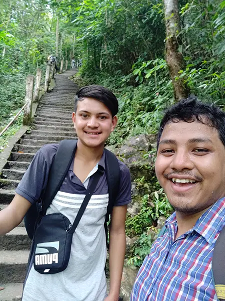 Joydeep The Gypsy Chiring with Kerri from Mawphlang Village during Double Decker Living Root Bridge Trek
