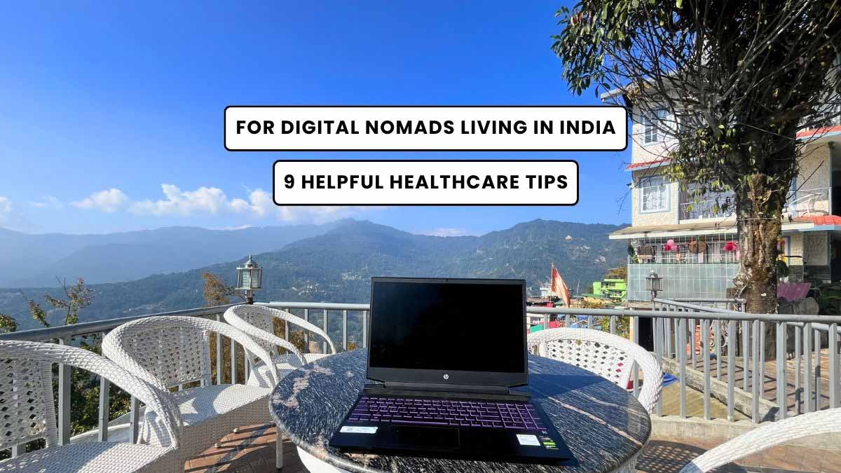 Helpful Healthcare Tips for Digital Nomads in India - with laptop on table working with the view of the green hills