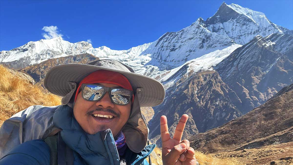 Joydeep The Gypsy Chiring Trekking in Nepal in front of fish tail peak during annapurna base camp trek