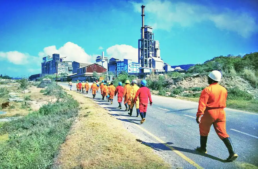 Wearing Caving suits walking near the Cements Factory heading to Krem mawmluh Caving