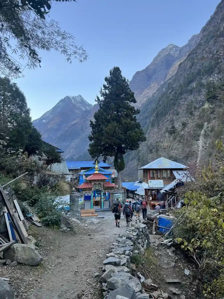 Trekkers nearing a teashop during trekking the Manaslu Circuit in Nepal